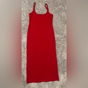 Elegant Red Sleeveless Dress with a split in the back of the dress.